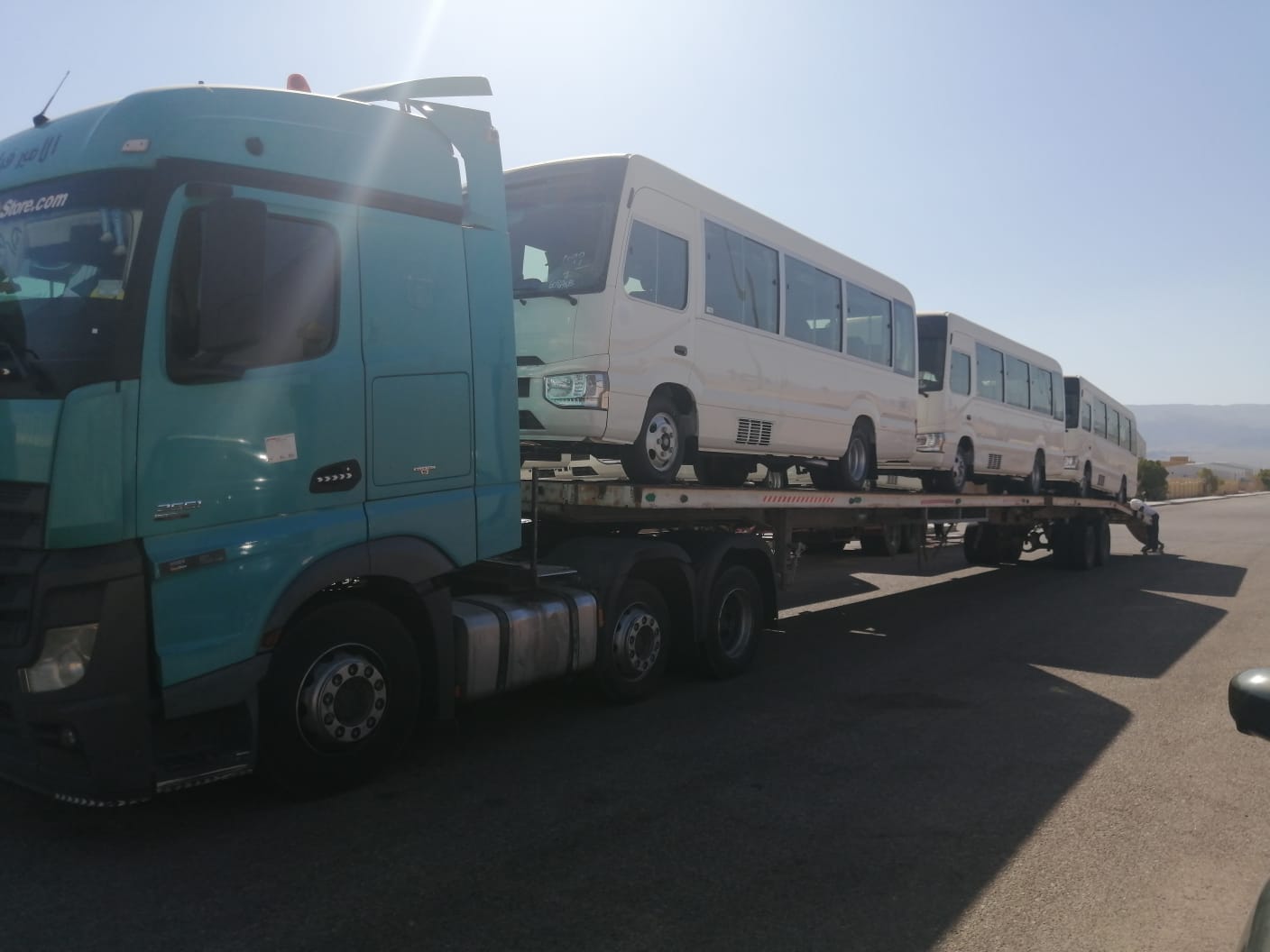 Truck Carrying Mini Buses